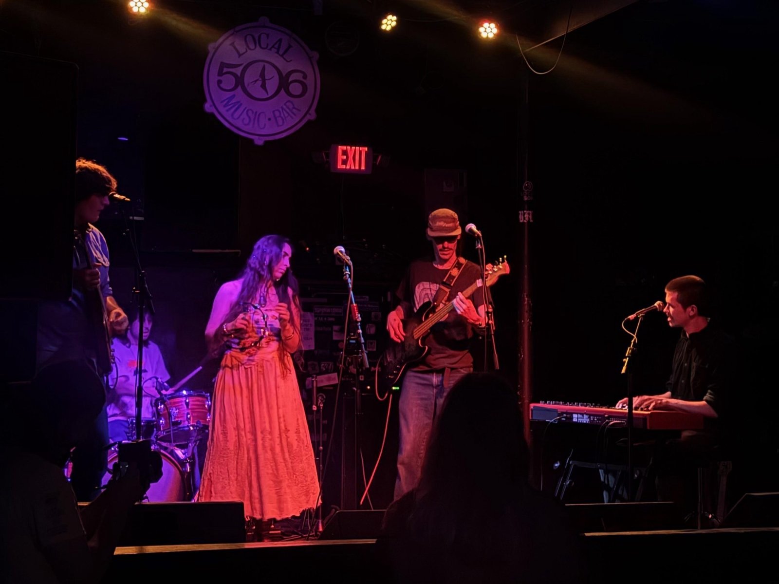 A band performs to a packed room at Local 506 in Chapel Hill.