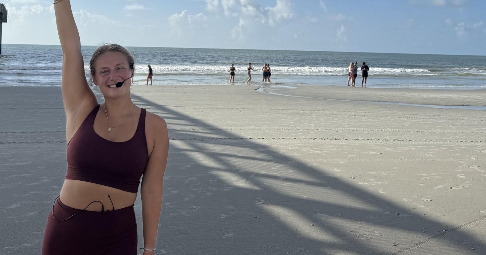 Kayla Runey leads a Pilates class on Surfside Beach, photographed by Tiffany Plusnick.